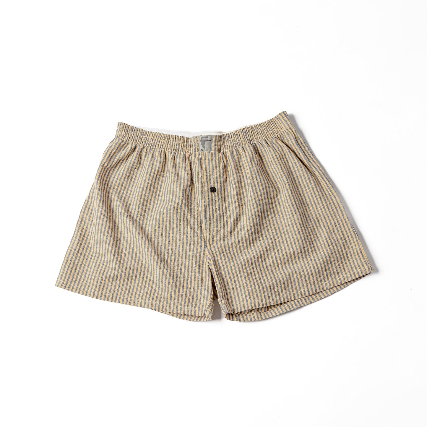 A pair of striped cotton shorts in yellow and black, with a button at the waist.