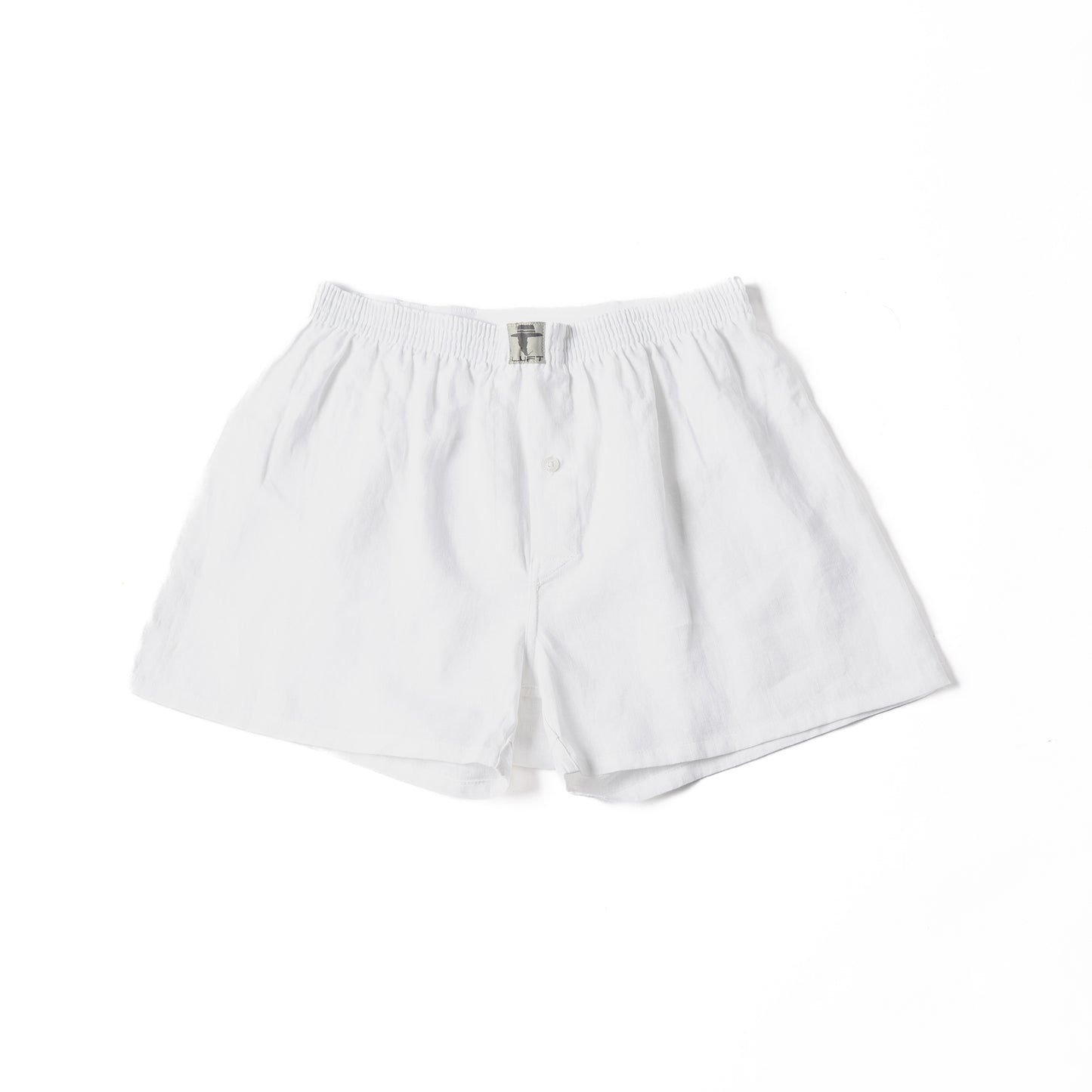 White 100% linen men's boxer shorts with a elastic waistband and a fly front closure.